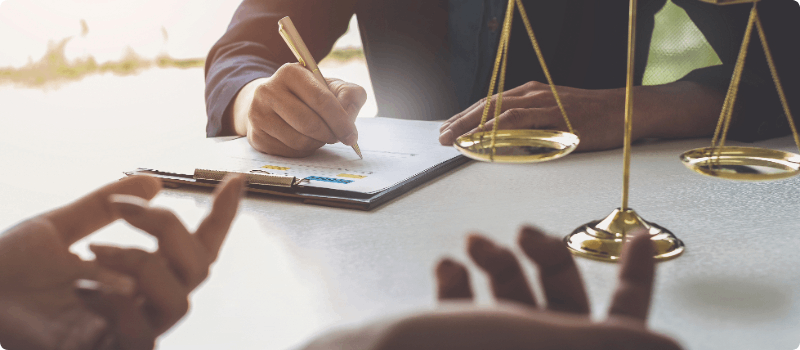 Person having a conversation with a lawyer.