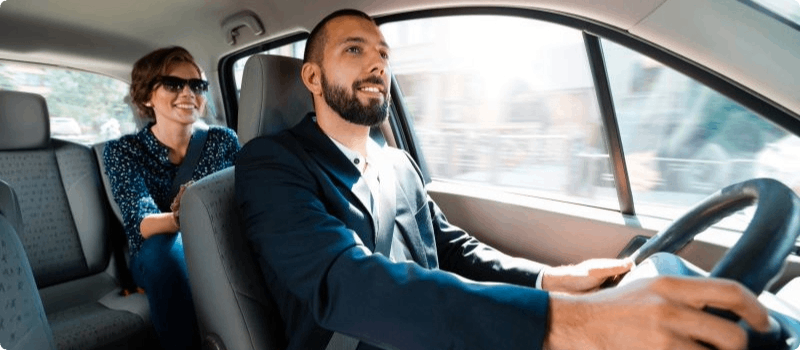 Person enjoying her rideshare ride.