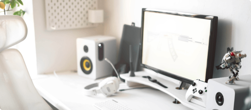 A home desk covered in electronics.
