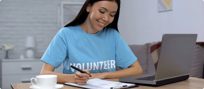 Volunteer working at her desk.