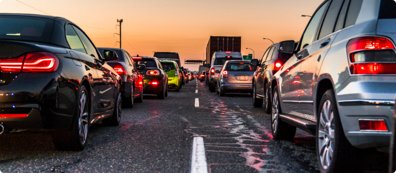 Cars stuck in stopped traffic.
