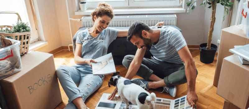 A couple in decorating their new living home.