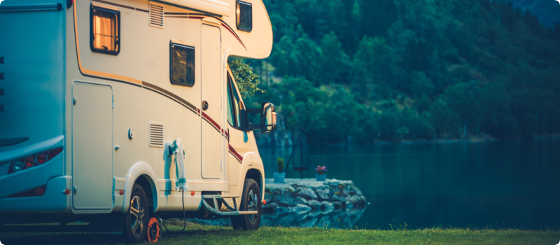 RV camped next to a lake