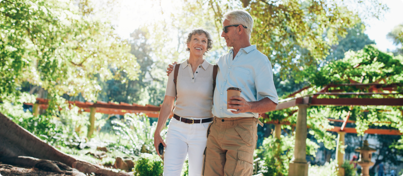 Senior couple walking in the park