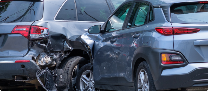 two cars damaged in a collision