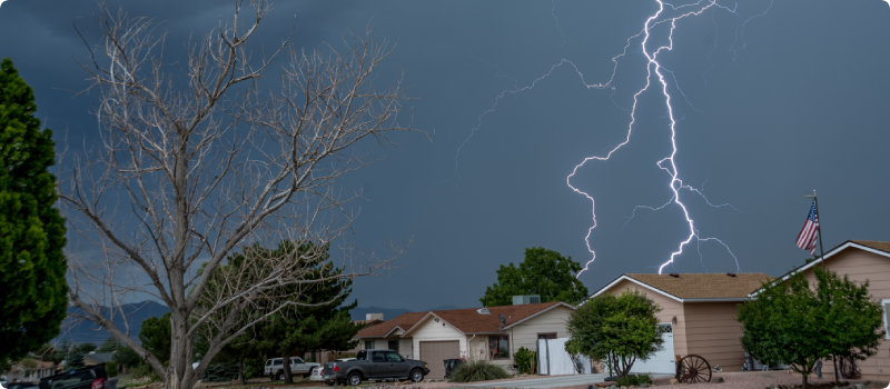 Lightning with dark sky during day time