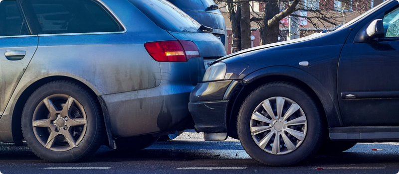 two cars involved in a rear-ending accident