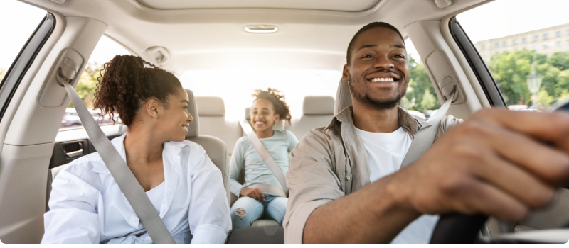 a family in their car