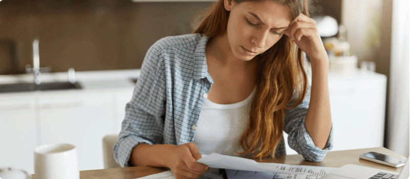 Woman looking at her budget.