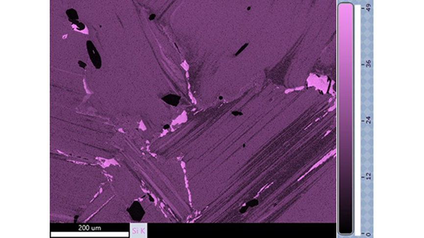 Wt% map of Si K from the center of the phenocryst shown in Figure 1. The brightest areas in the image can be identified as quartz (silicon dioxide) due to the Wt% indicated by the color scale. Si Wt% in stoichiometric quartz is 46.7%.