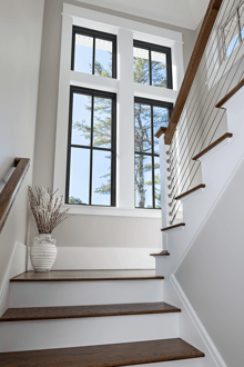 Black windows in stairs by Renewal by Andersen