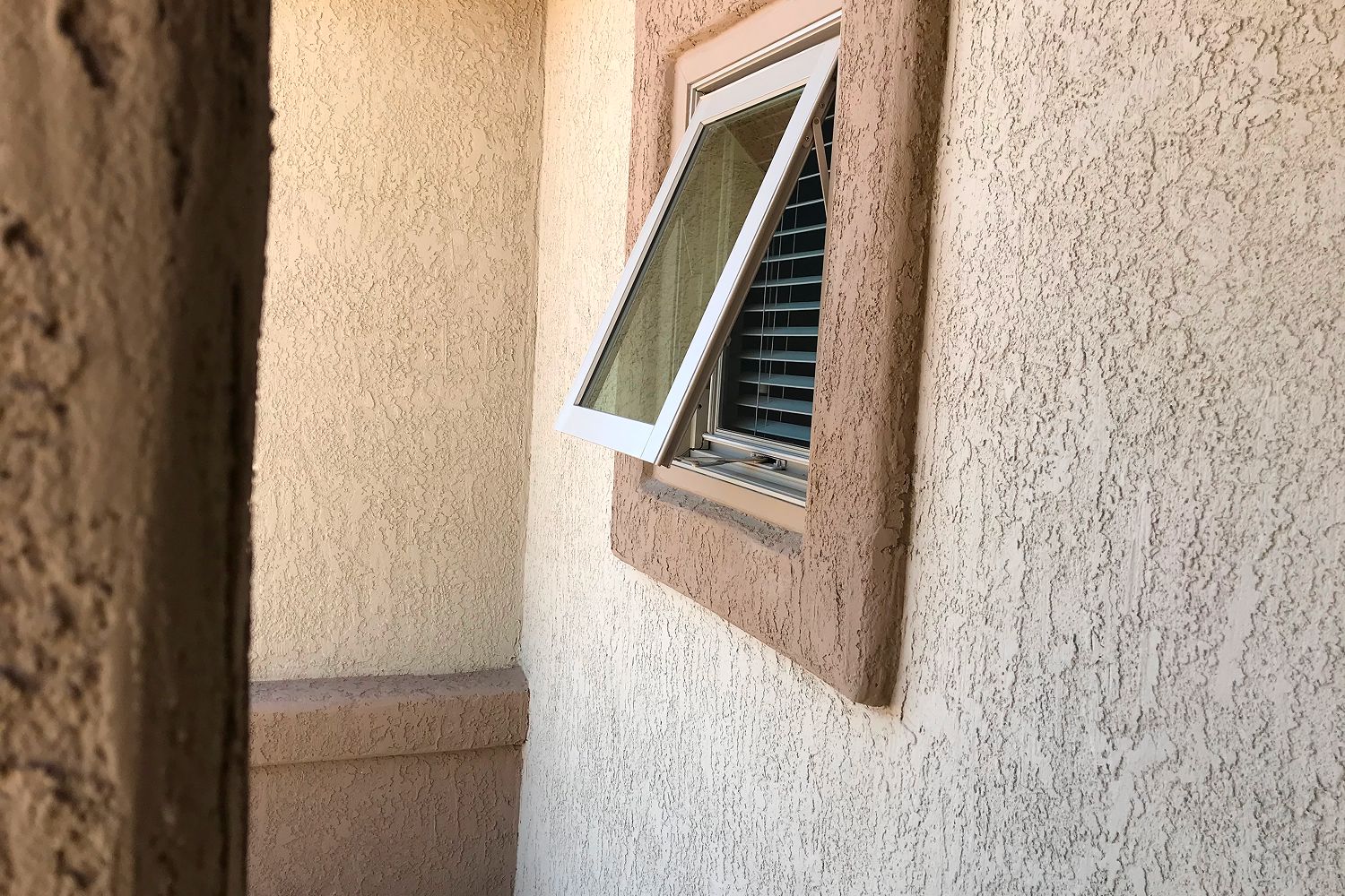 Renewal by Andersen Basement windows awning