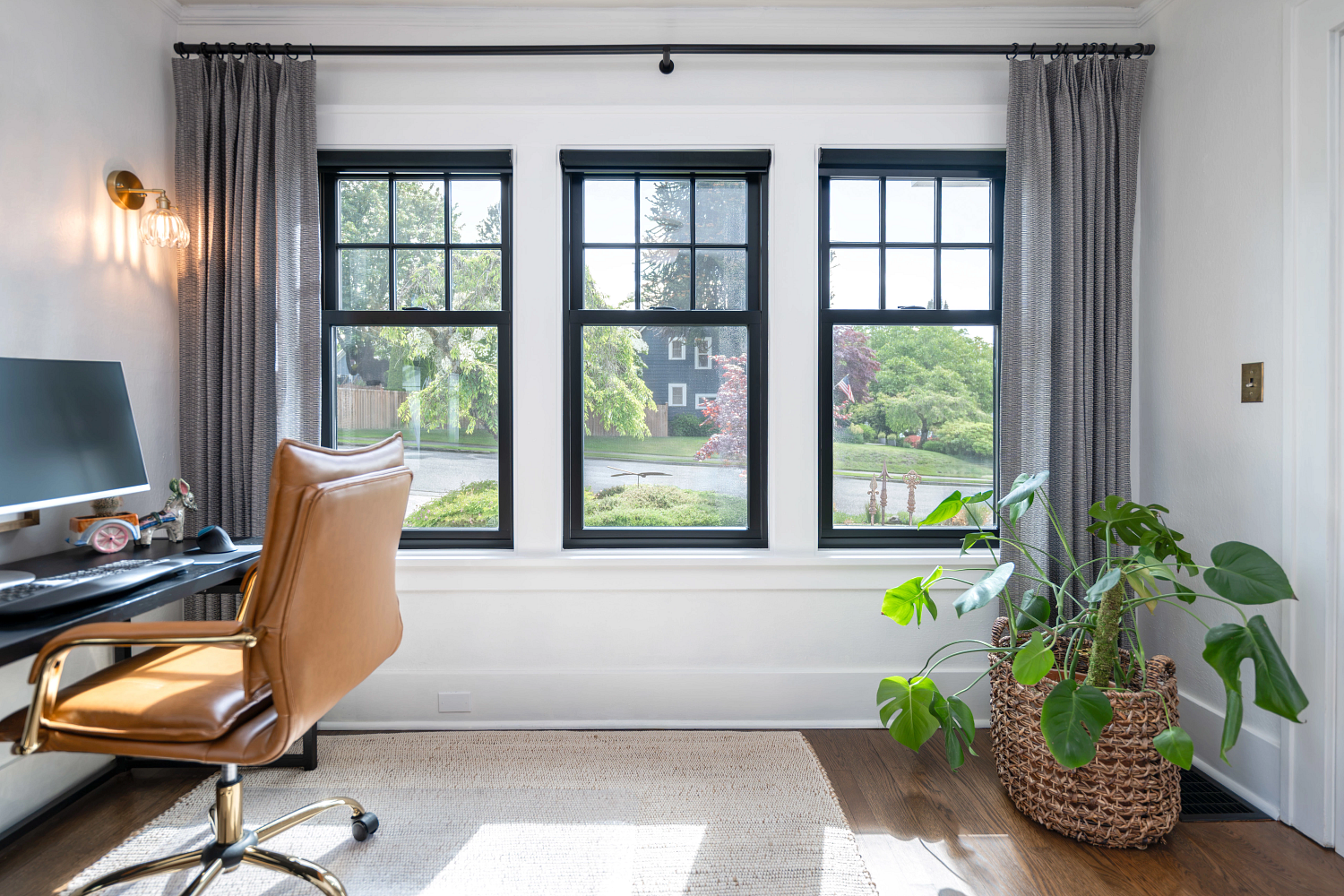 Three windows by Renewal by Andersen in a home office