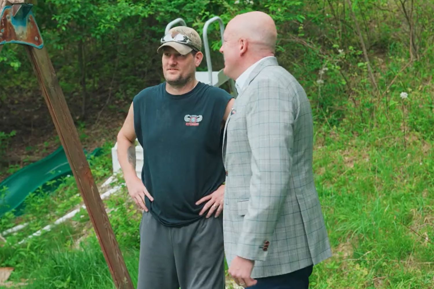 Bill Essary and Pittsburgh Steelers owner talking together in Bill's yard.
