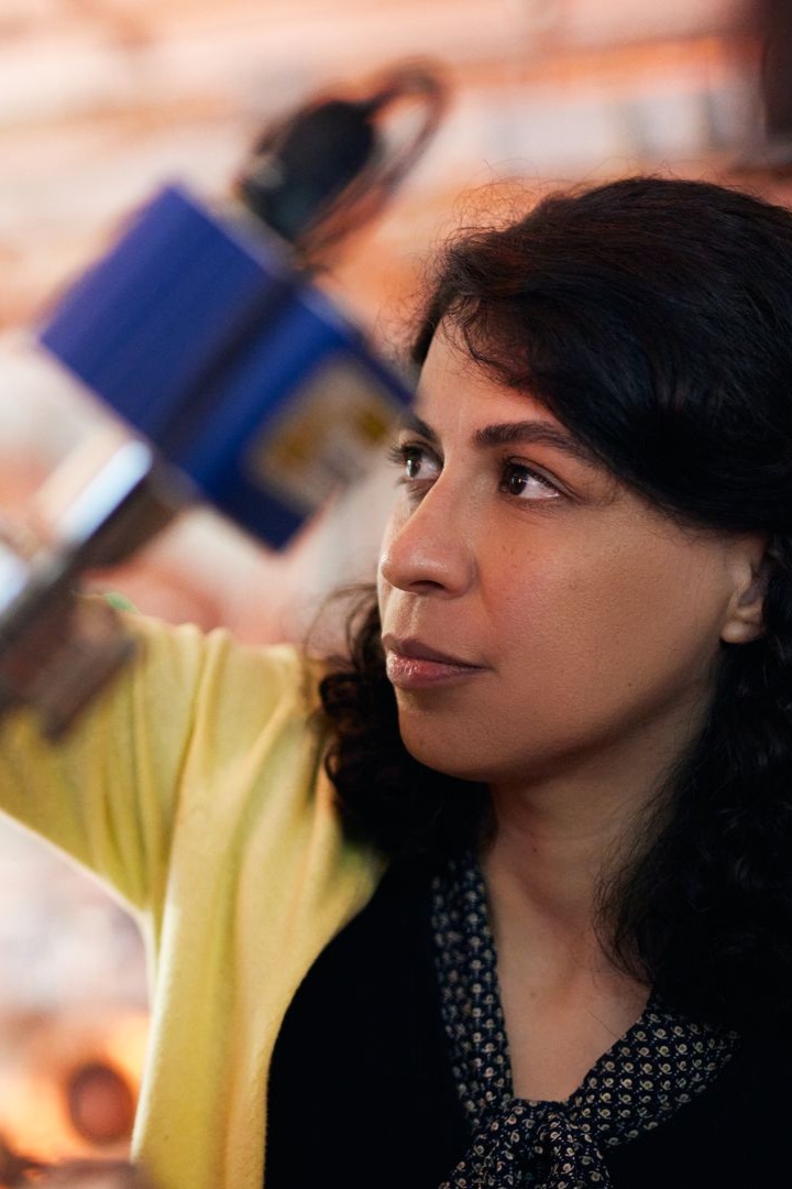 Woman working on an machine