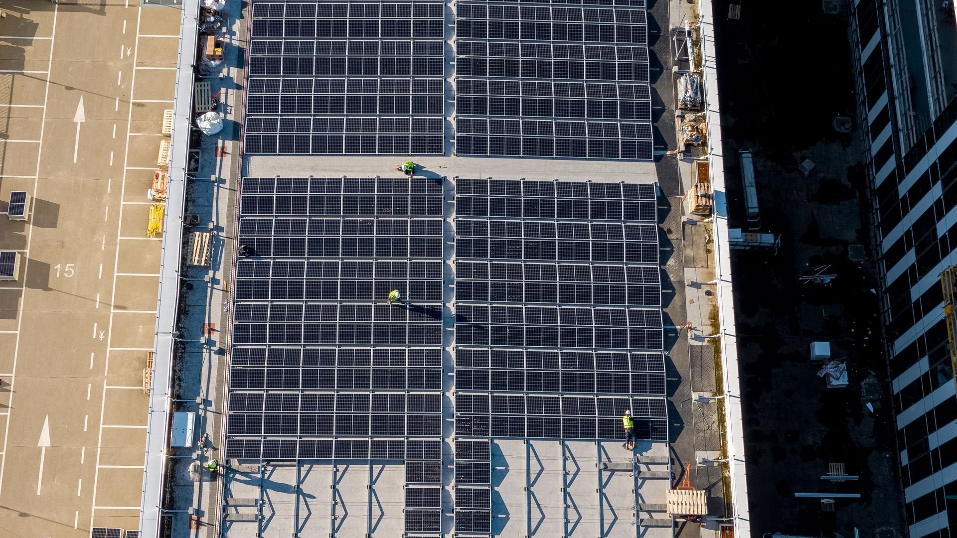 drone shot of ASML building with solar panels