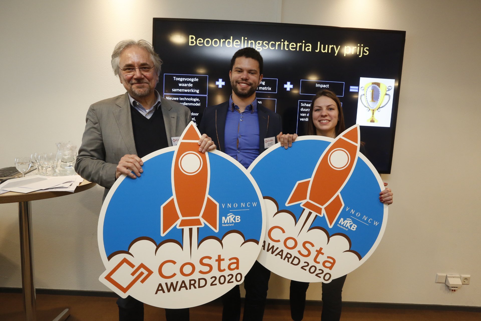three people holding two signs for CoSta Award 2020 for Incooling