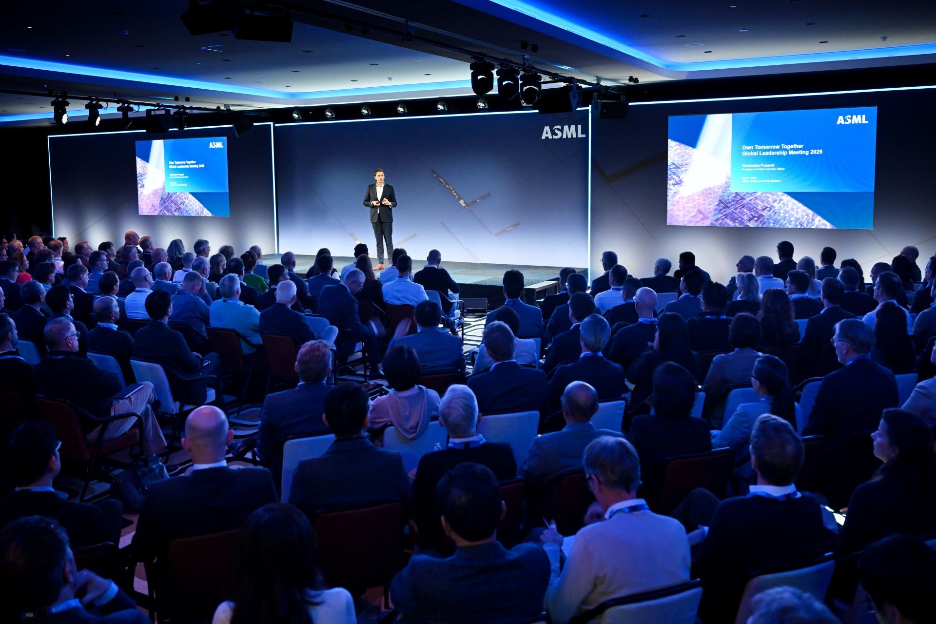 ASML CEO Christophe Fouquet speaking on stage at an event