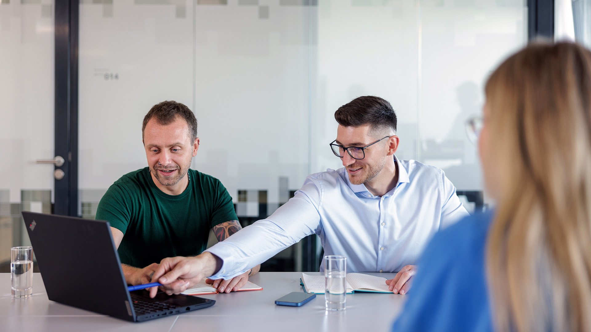 ASML employees collaborating in a meeting ASML employees collaborating in a meeting