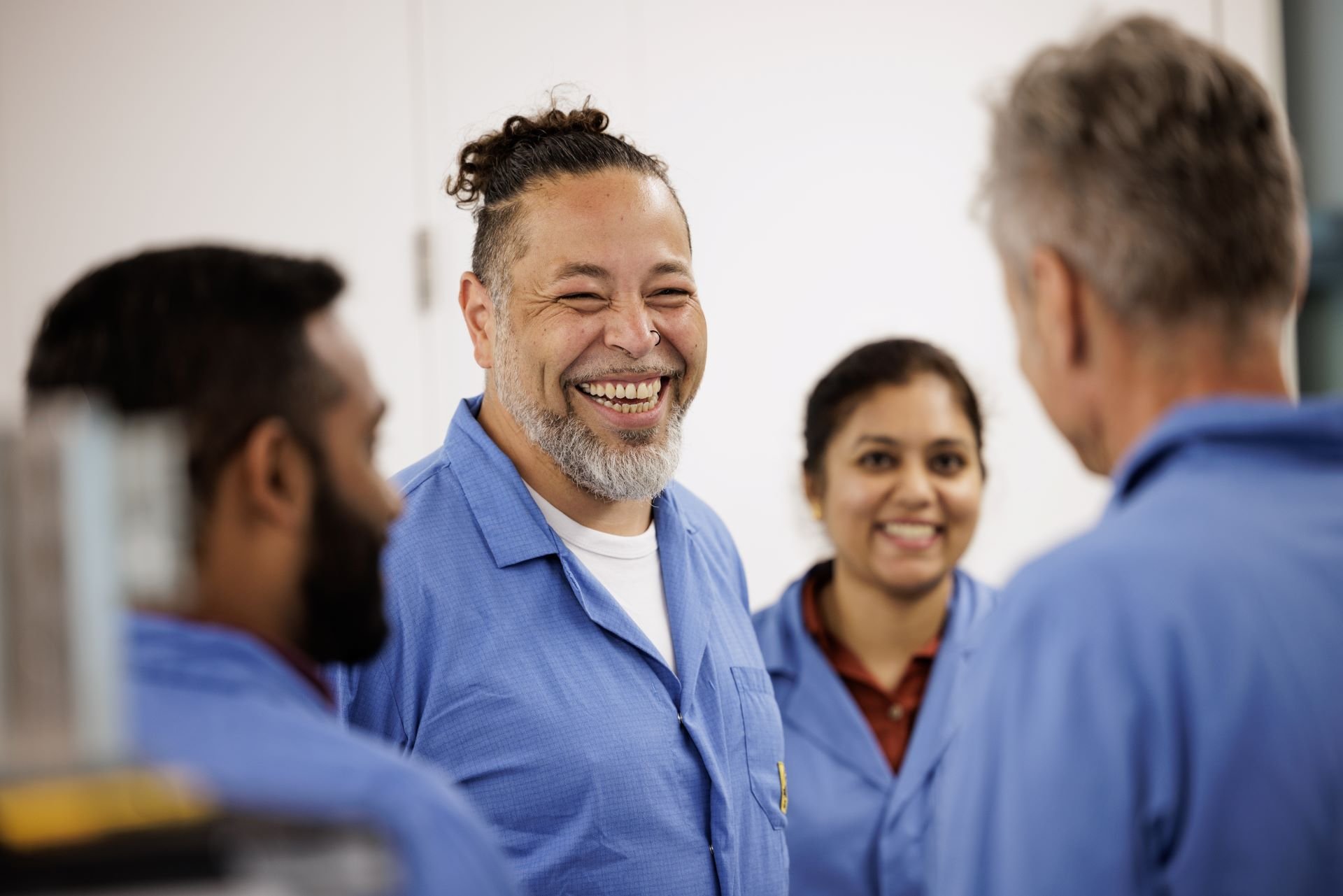 Group of employees discussing work Group of employees discussing work
