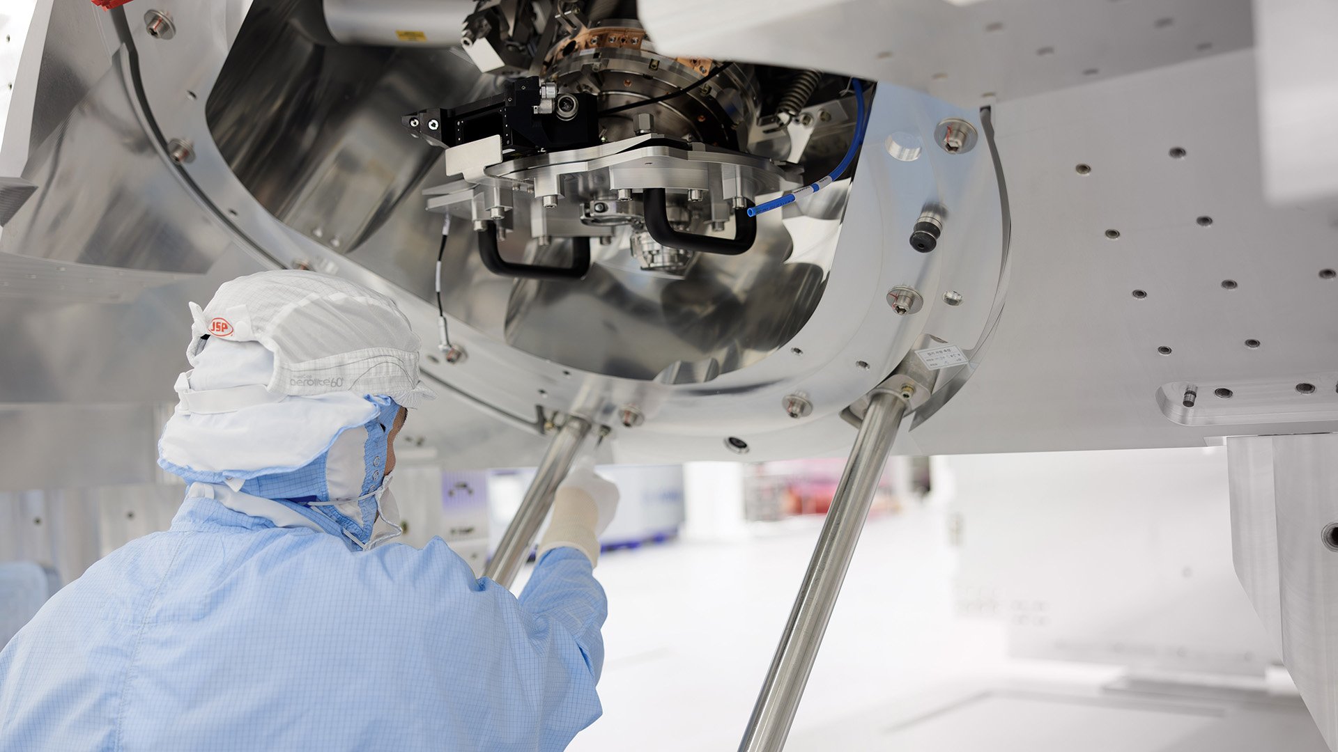 Technician working on precision equipment