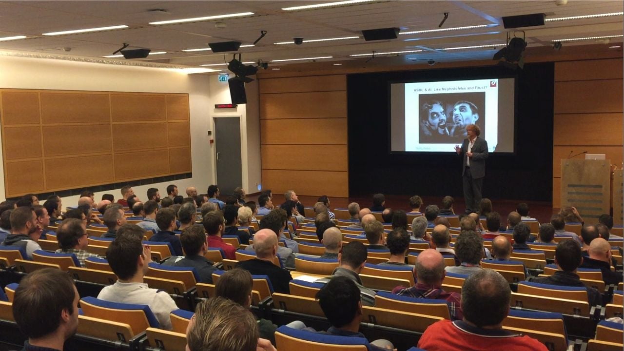 Pim Haselager speaks to a crowded auditorium at an ASML Tech Talk in Veldhoven, the Netherlands.