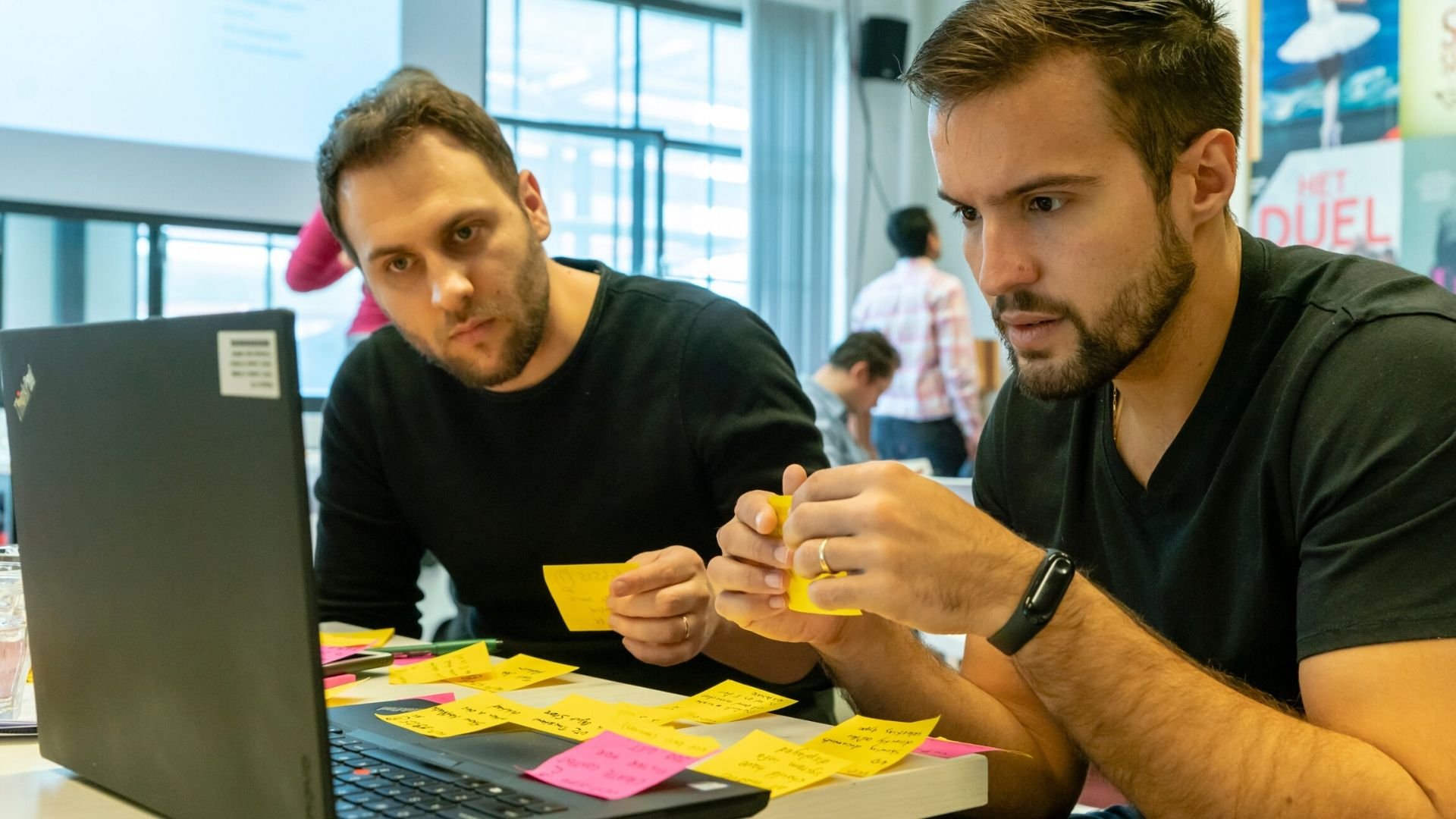 Software developers work at one of ASML's Agile planning events in Eindhoven, the Netherlands.