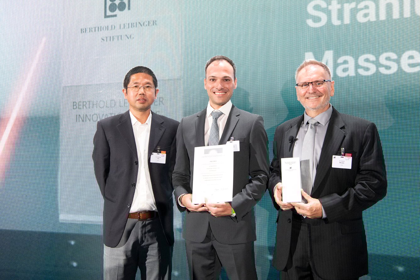 Three ASML employees who recieved the Leibinger Innovation Prize for the efforts in EUV light source development post for a photo at the award ceremony. Three ASML employees who recieved the Leibinger Innovation Prize for the efforts in EUV light source development post for a photo at the award ceremony.