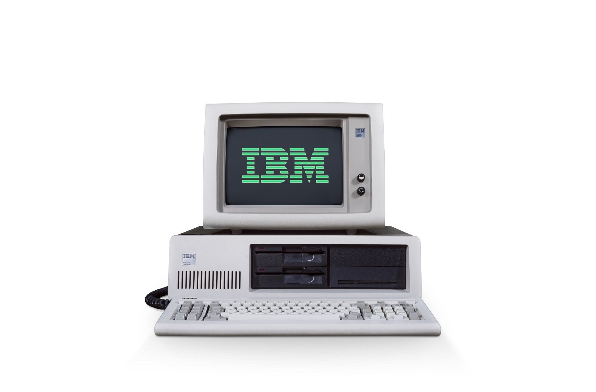 A picture of the IBM PC with IBM’s logo displayed on the screen.