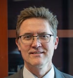 A headshot of Lee Schroeder, member of the Africa Subcommittee