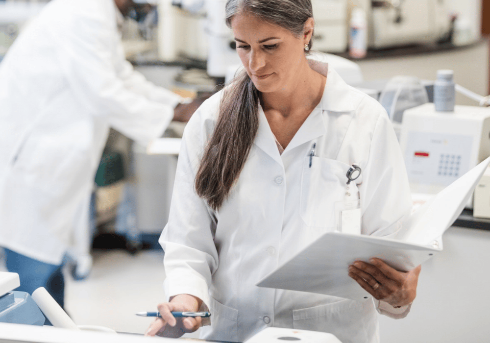 woman in lab coat representing a lab director