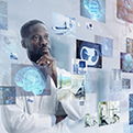 Scientist looking at various images using modern medical technology.