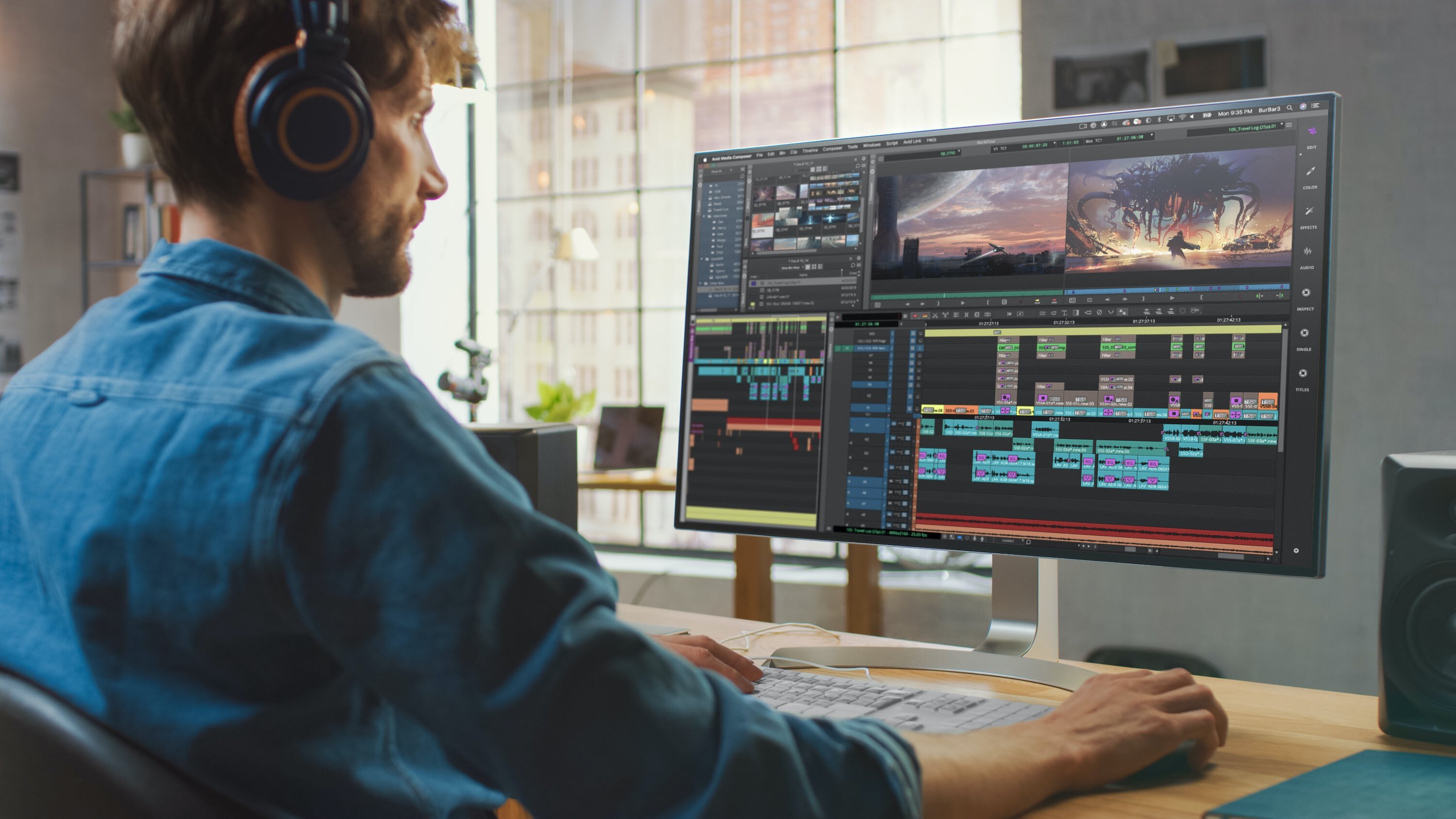A remote video editor collaborates with his team while working on a project from home.