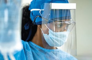 African-American healthcare worker in scrubs. 