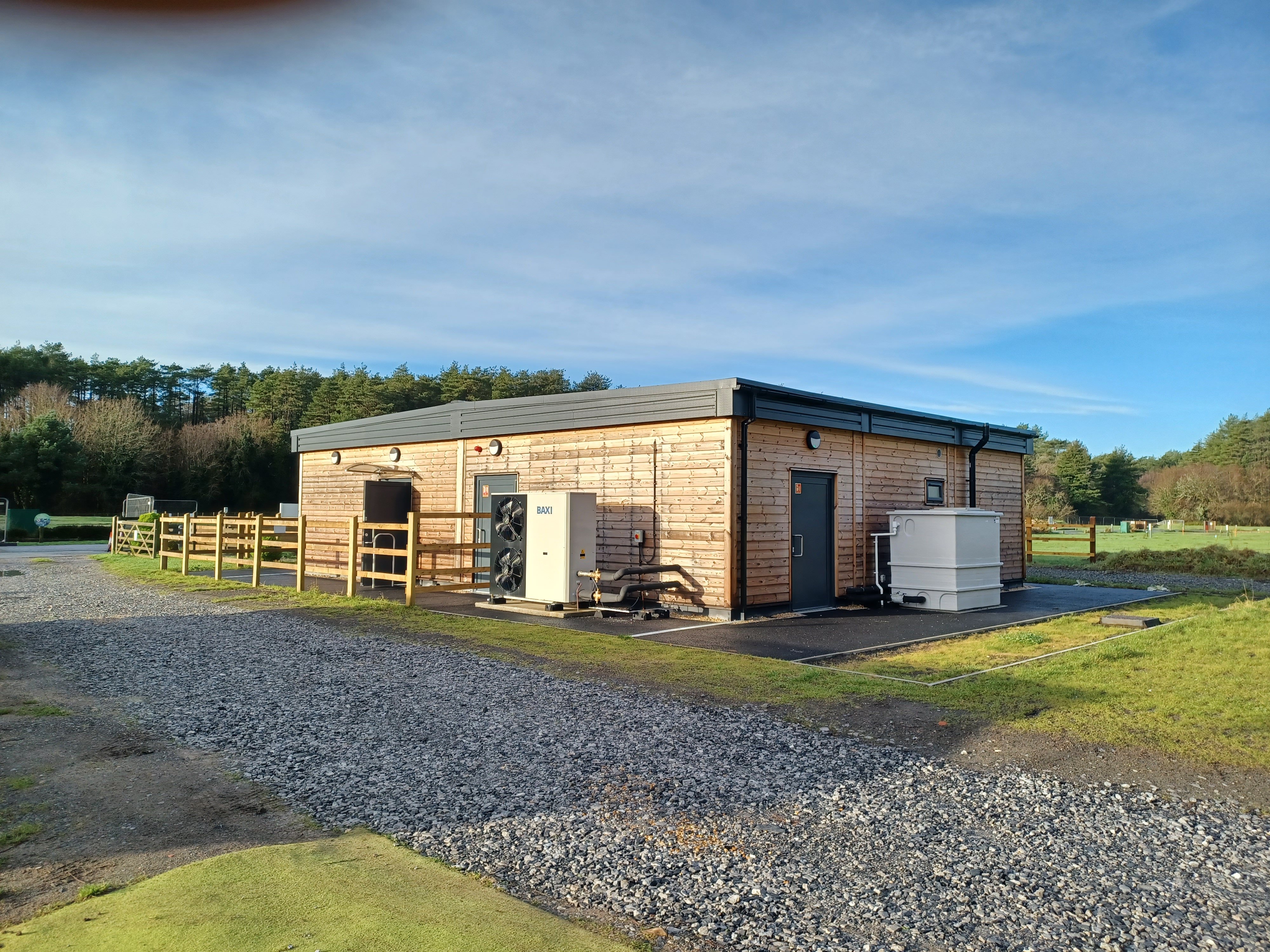 Baxi air source heat pump (ASHP) system- energy-efficient, low-carbon hot water solution at Pembrey Country Park