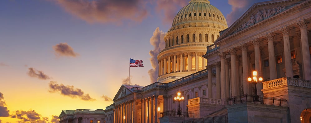 Exterior of a capital building during sunset