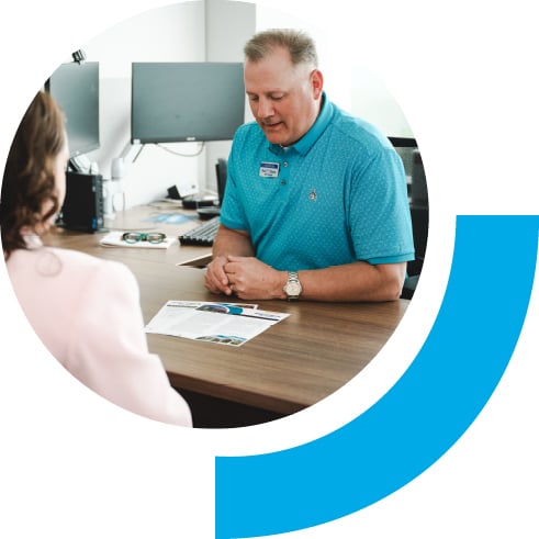 Bell employee working with a customer.