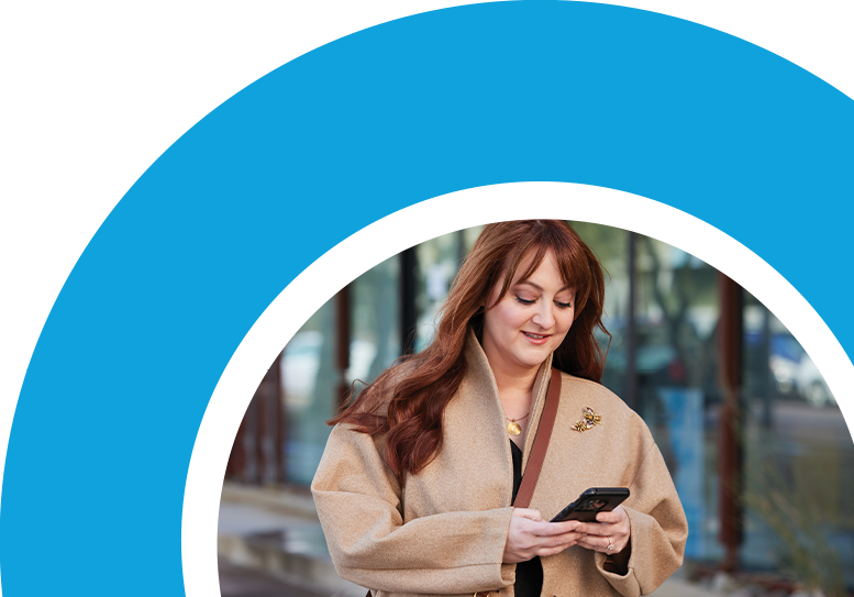 Photo of woman walking on the phone