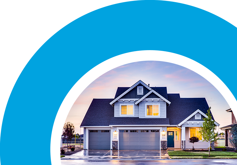 Front view of a nicely lit blue house