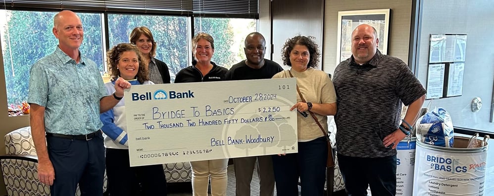 Pay It Forward - Bridge to Basics group photo with check