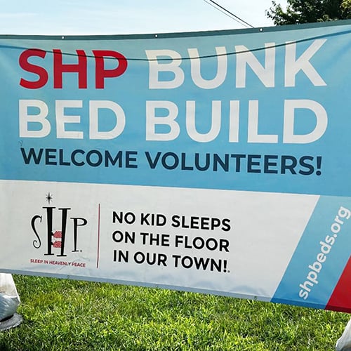 Pay It Forward Story - Building Dreams_volunteer banner