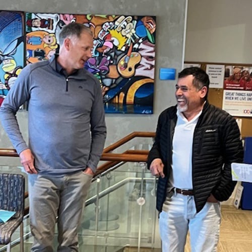 Bell Bank employee with Pay It Forward recipient