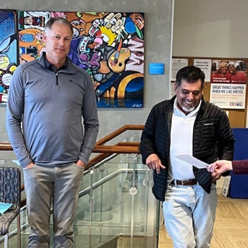 Bell Bank employee with Pay It Forward recipient