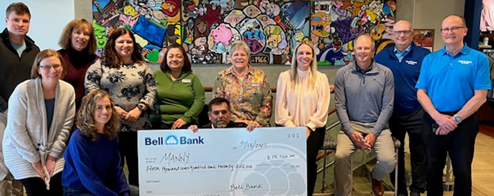 Bell Bank employees with Pay It Forward recipient
