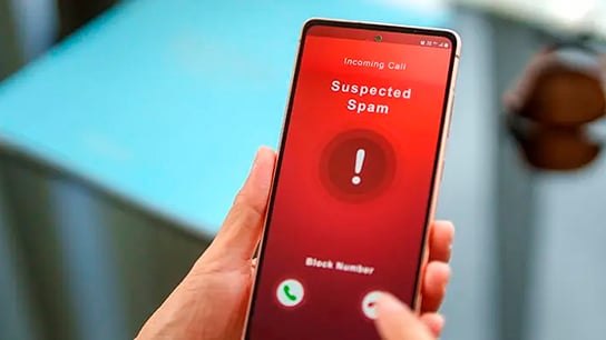 A red "suspected scam" warning sign