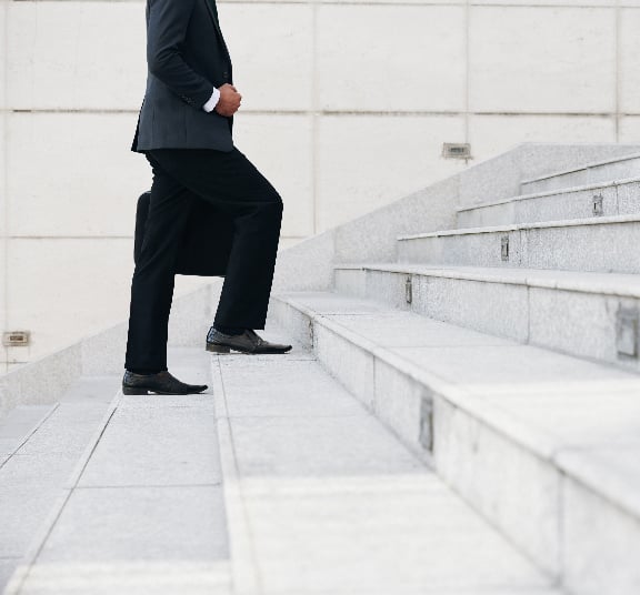 Man walking up stairs