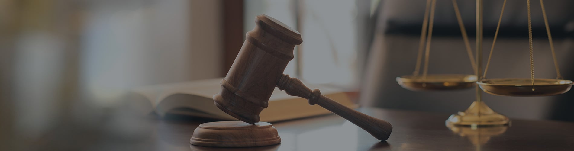 judge gavel, law books and scales of justice on desk in lawyer office. legal justice concept.