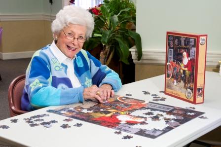 Older woman doing a puzzle