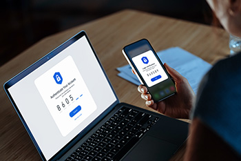 Person using multi-factor authentication for security