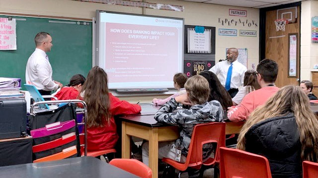 BOK Financial employee volunteers enjoy teaching students about financial literacy.